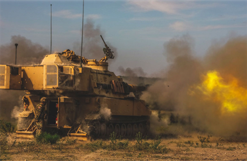 tank shooting a round