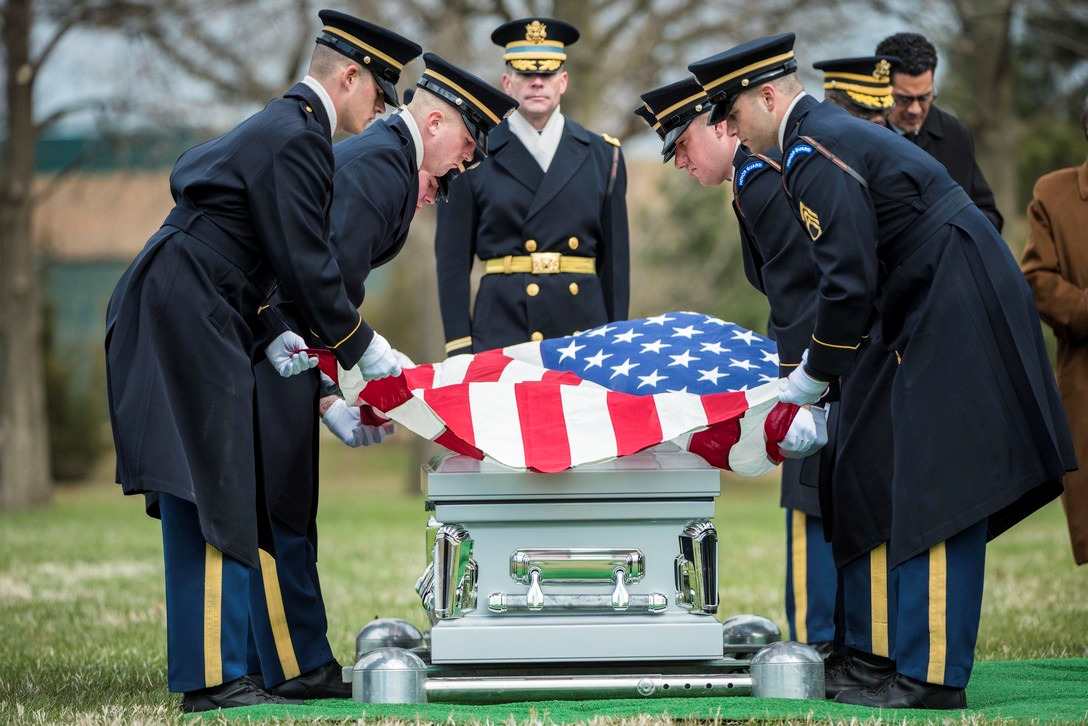 Honor Guard burial ceremony folding the american flag